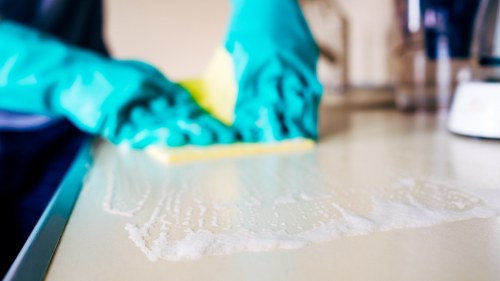 Commercial office cleaning team working in SW12